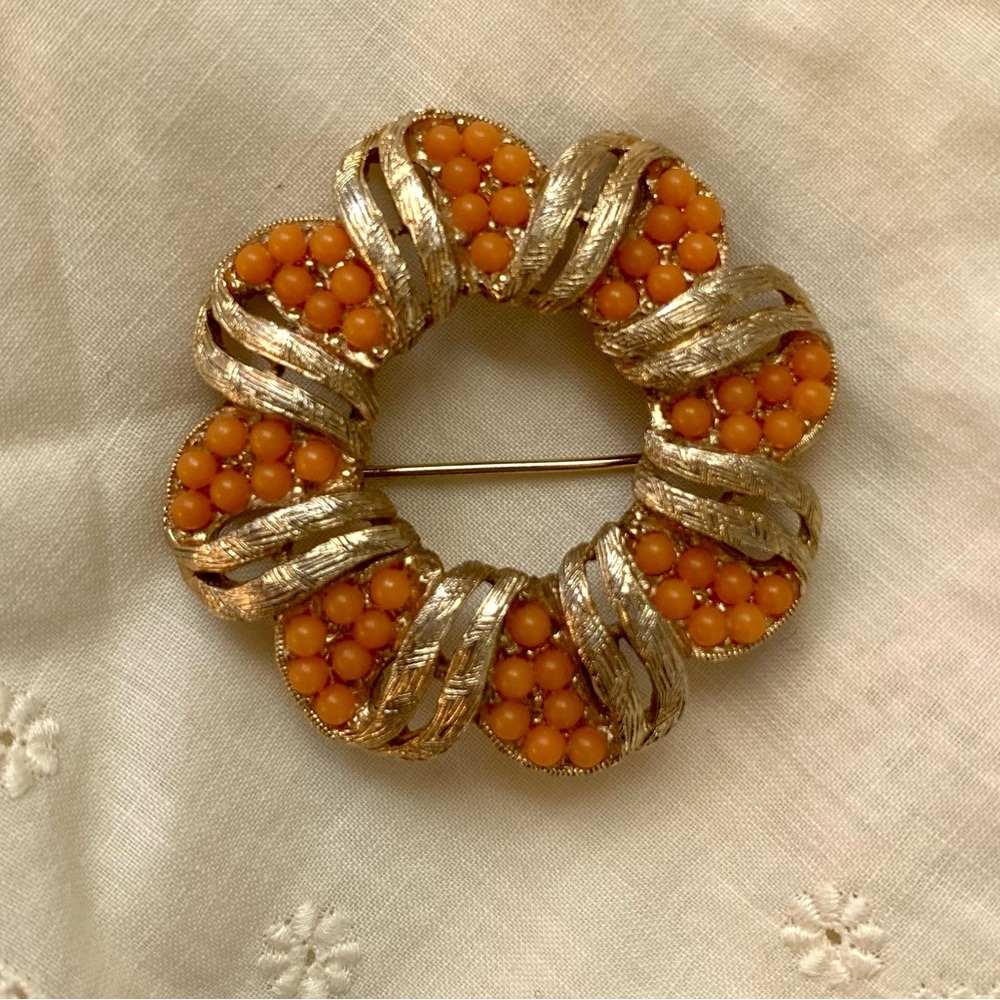 Vintage circle pin with coral beads and gold accents